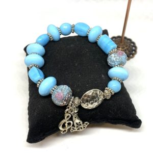 bracelet-cle-de-sol-et-noeud-papillon